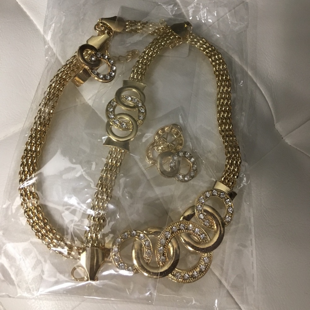 Imitation gold necklace, bracelet, earrings & ring